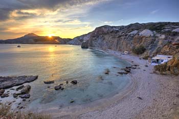 <b>Greece, Milos</b>, Elevated view of Fyrinaka beach at sunset